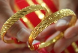 Giá vàng ngày 9/8/2014: Bất ngờ quay đầu giảm giá nhưng vẫn ở mức cao
